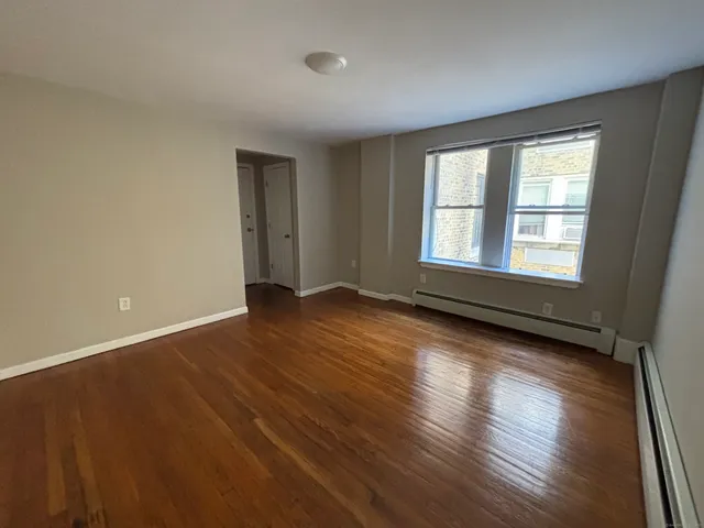 a kitchen with a sink stove and refrigerator
