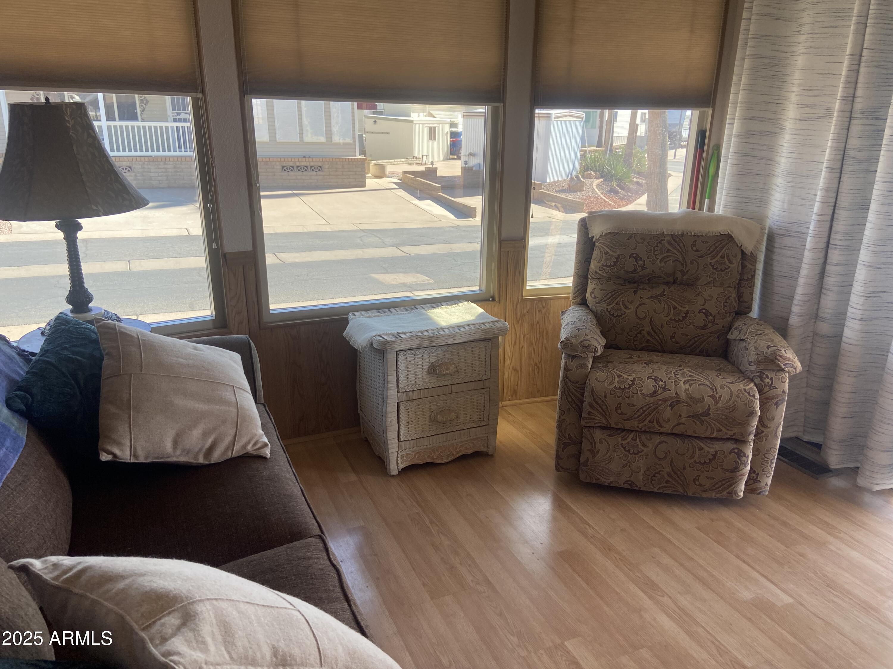 1206 West Klamath Avenue Apache Junction, AZ 85119 - Photo 5 of 35 a living room with furniture and a large window