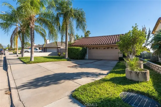 a front view of a house having yard