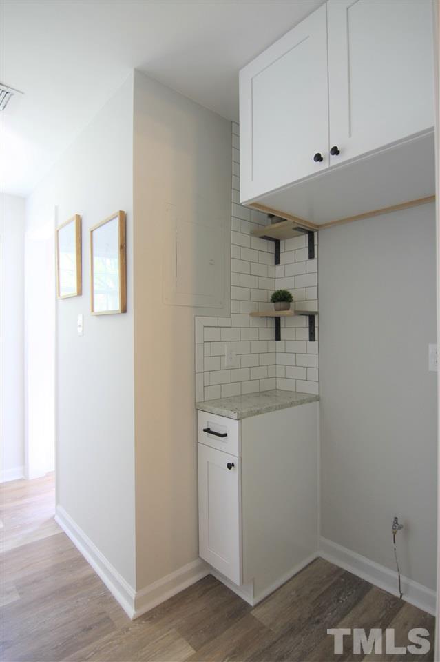 6367 New Market Way, Unit 6367 Raleigh, NC 27615 - Photo 3 of 20 a bathroom with a shower