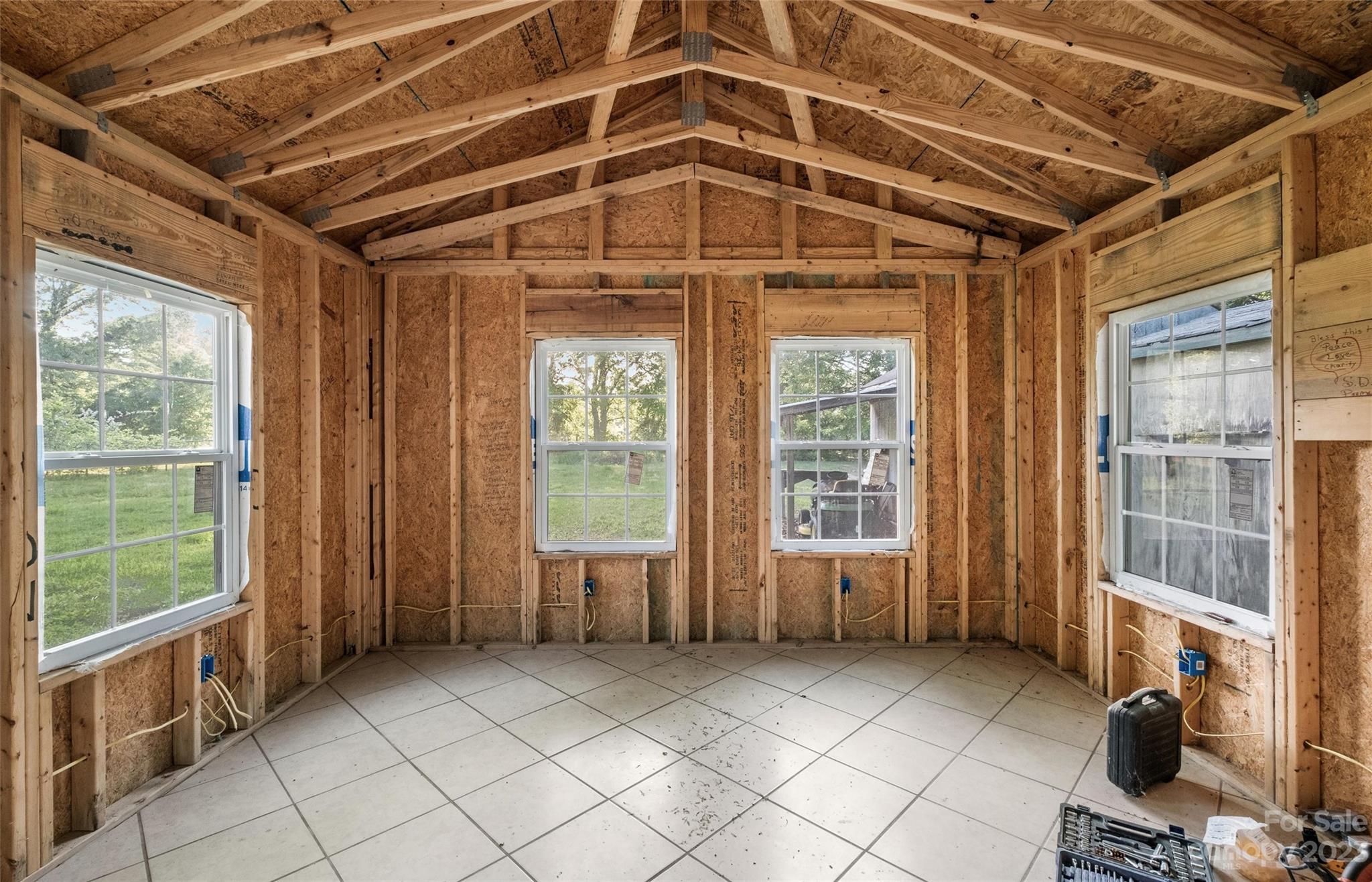 915 Harper Road Gastonia, NC 28056 - Photo 19 of 27 a view of an empty room with a window