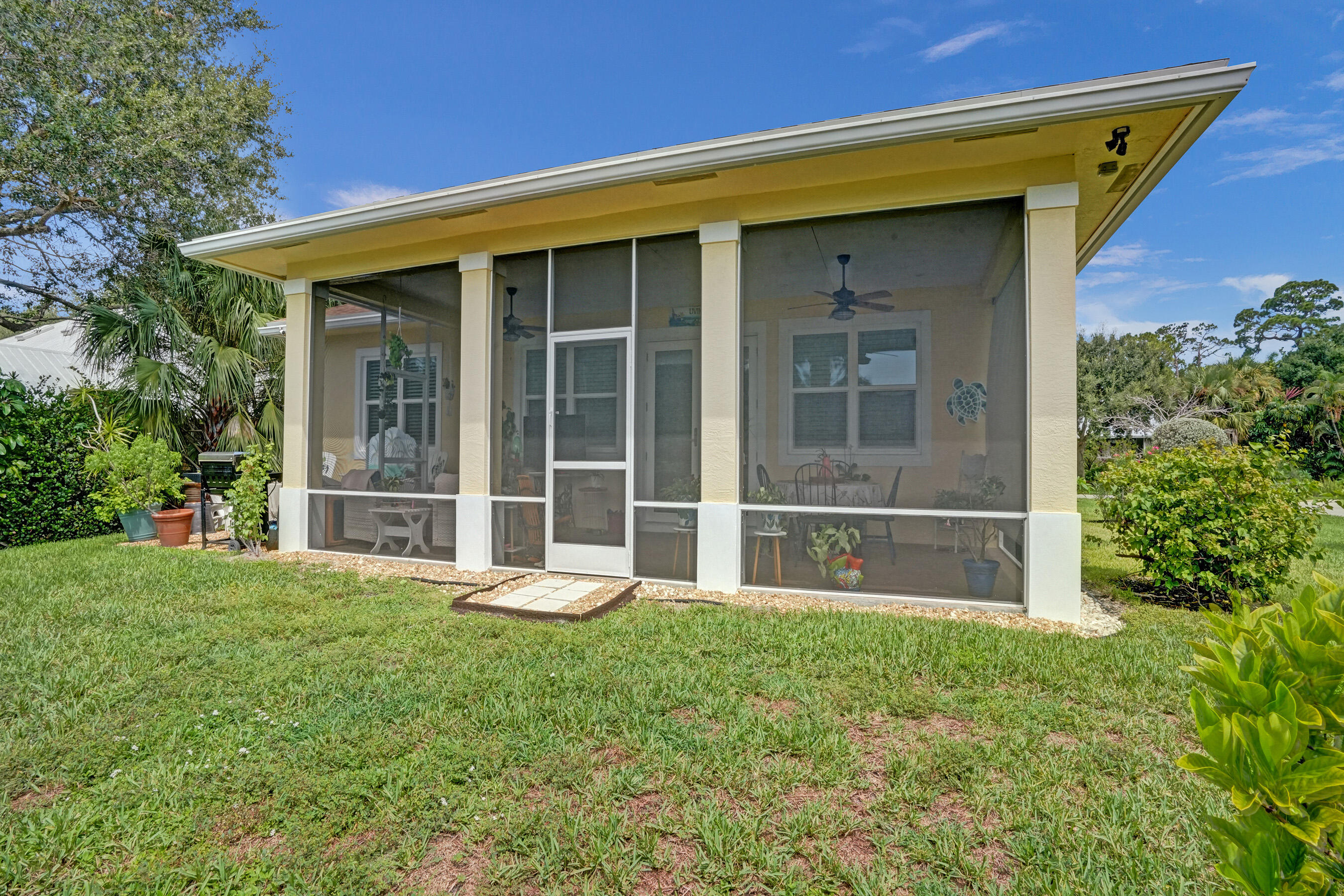 4487 Southeast Chelsea Circle Stuart, FL 34997 - Photo 25 of 36 12x28 Enclosed Covered Patio