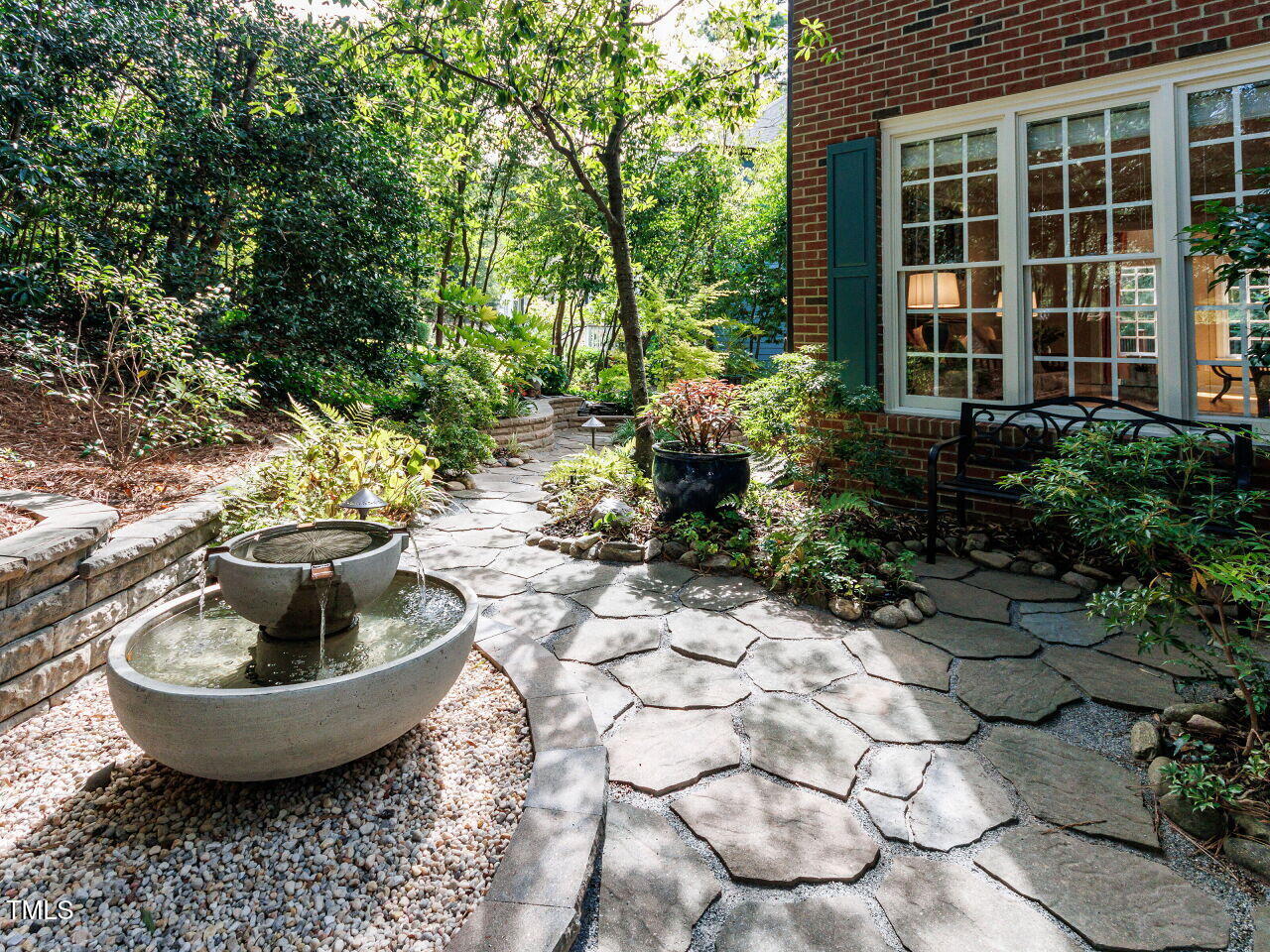 4613 Wee Burn Trail Raleigh, NC 27612 - Photo 6 of 49 a view of a backyard with sitting area