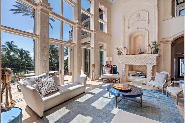 a living room with furniture fireplace and a fireplace