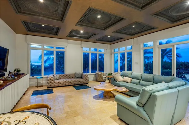 a bedroom with a large bed and a couch