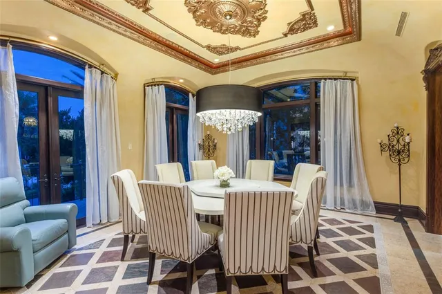 a view of an chairs and table in the patio