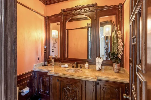 a bedroom with a large bed and a couch