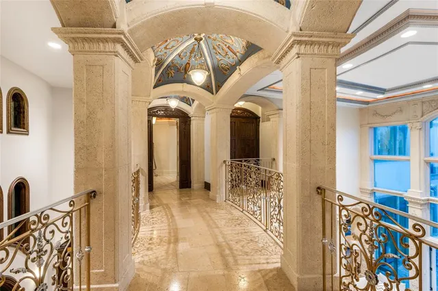 a spacious bathroom with a tub sink and mirror