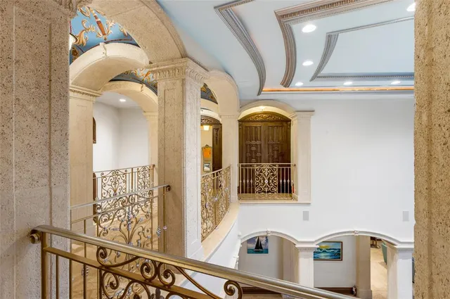 a bed room with a bed and a chandelier