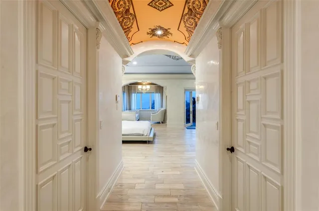 a bathroom with a granite countertop toilet a sink and a mirror