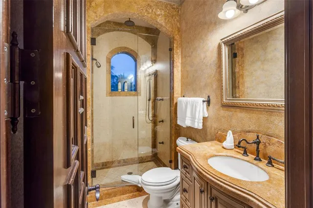 a view of a backyard with sitting area