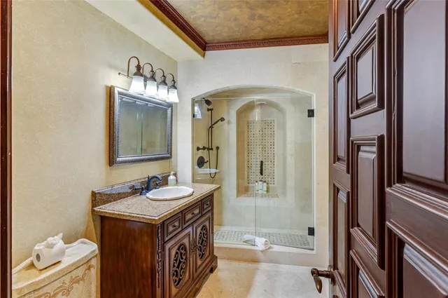 an aerial view of a house with a garden