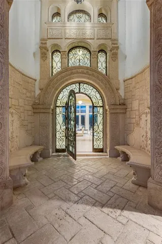 a living room with furniture a fireplace and a fireplace