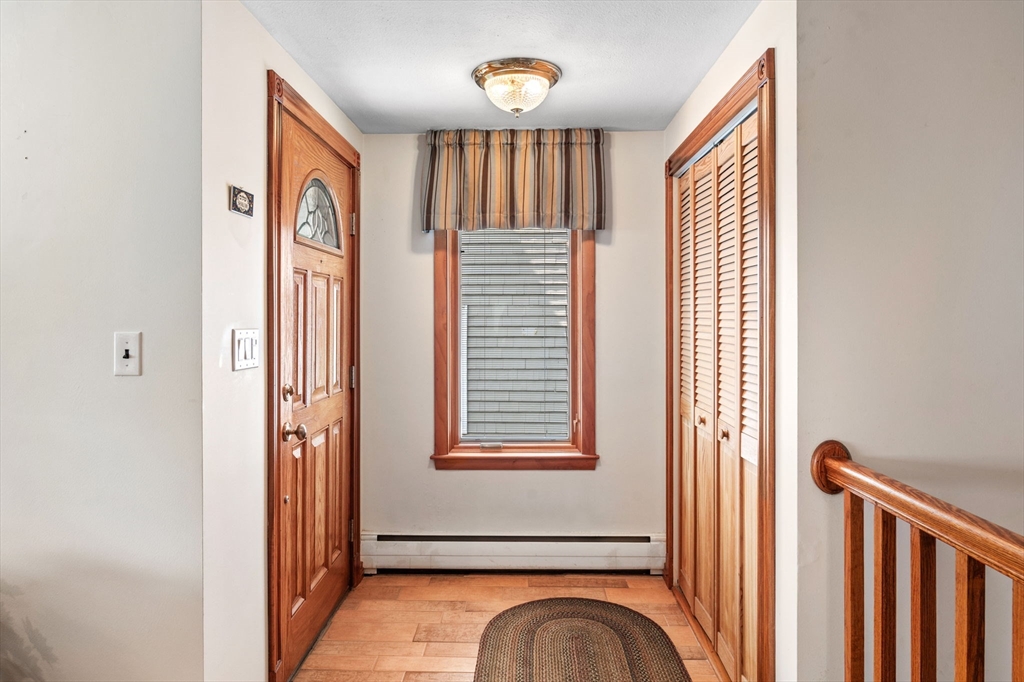 22 Thompson Road Marblehead, MA 01945 - Photo 3 of 41 a view of front door with stairs