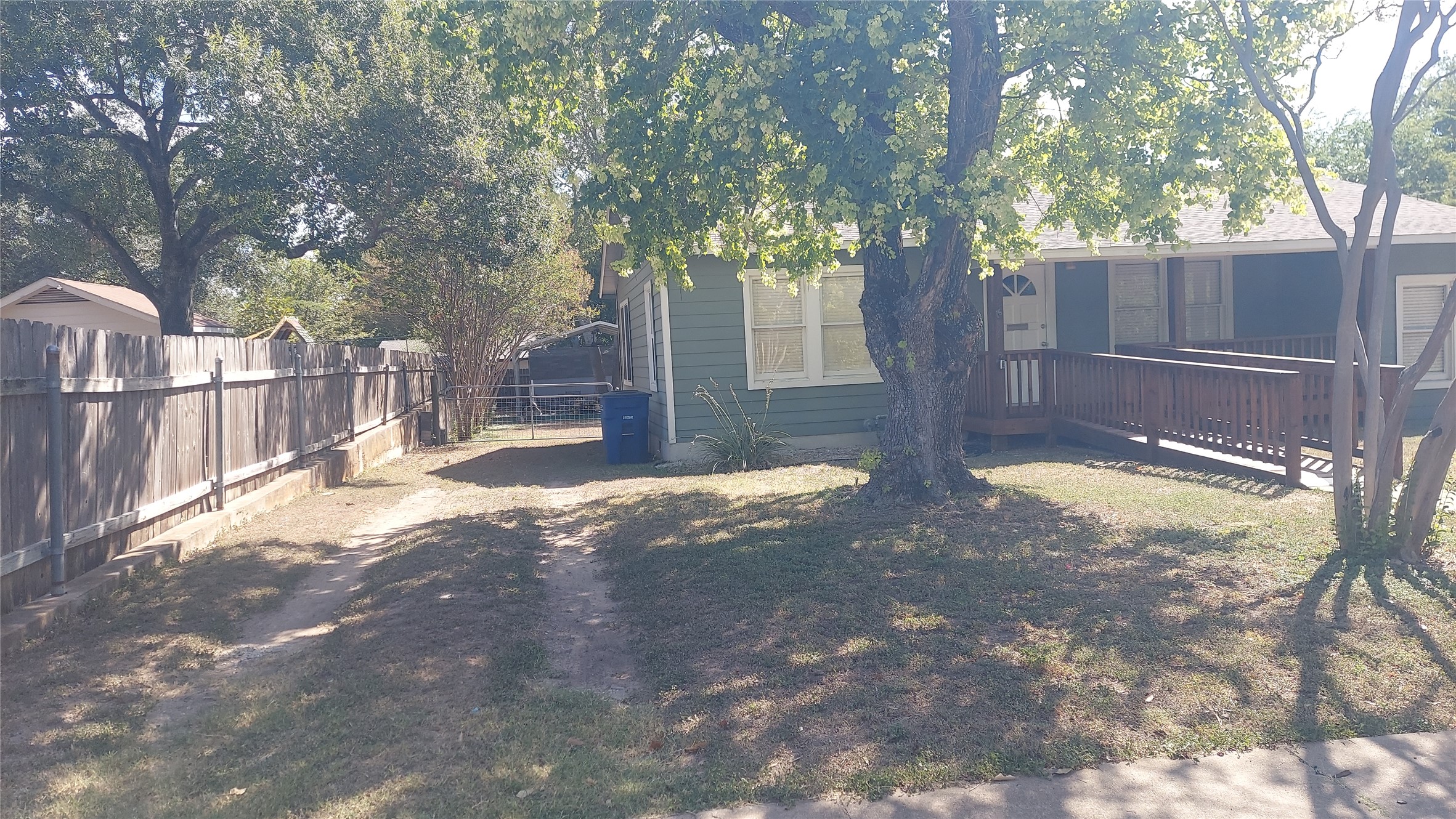 1411 Ruth Avenue Austin, TX 78757 - Photo 5 of 26 OFF STREET PARKING WITH DRIVEWAY THAT GOES THRU GATE TO CARPORT