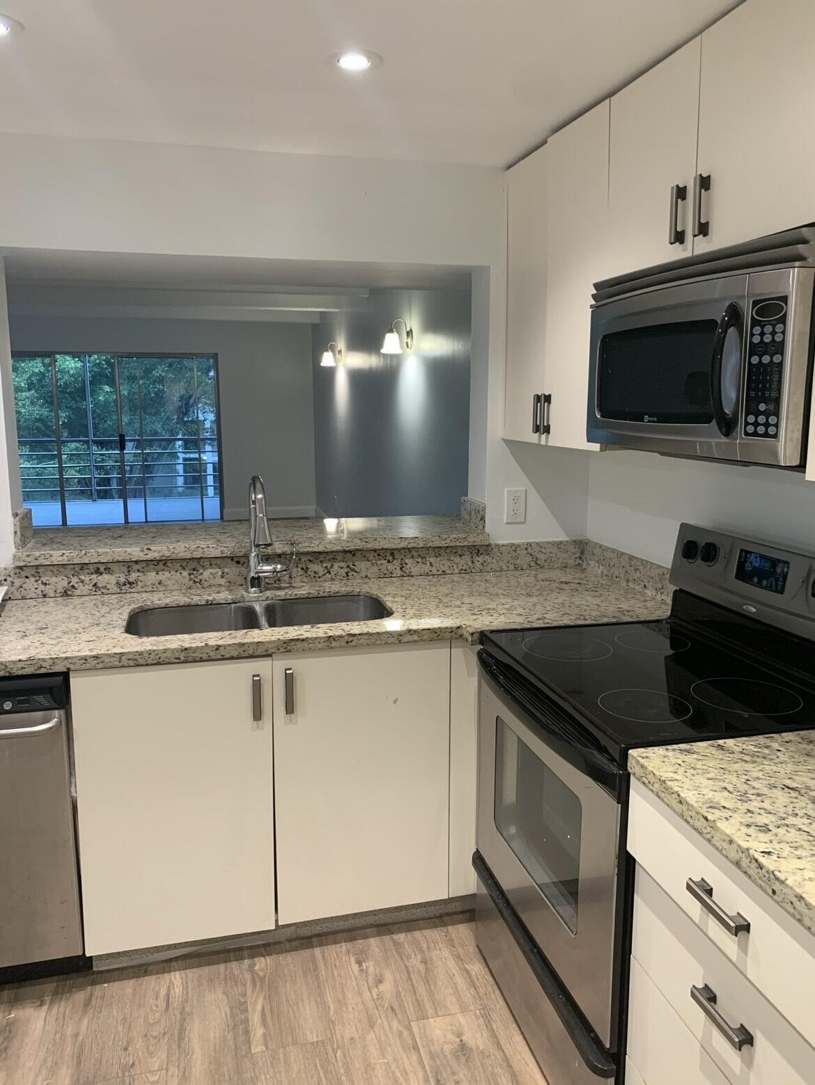 10120 Boca Entrada Boulevard, Unit 307 Boca Raton, FL 33428 - Photo 2 of 26 kitchenn
