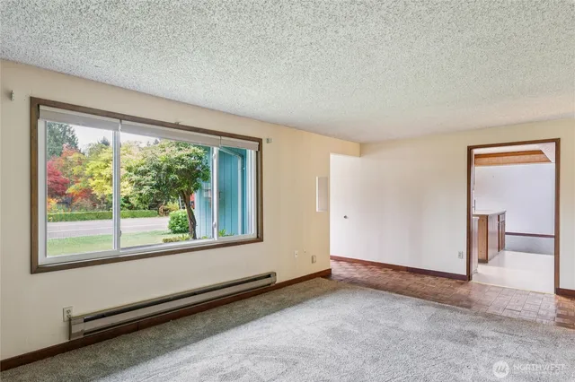 a kitchen with a sink and a refrigerator
