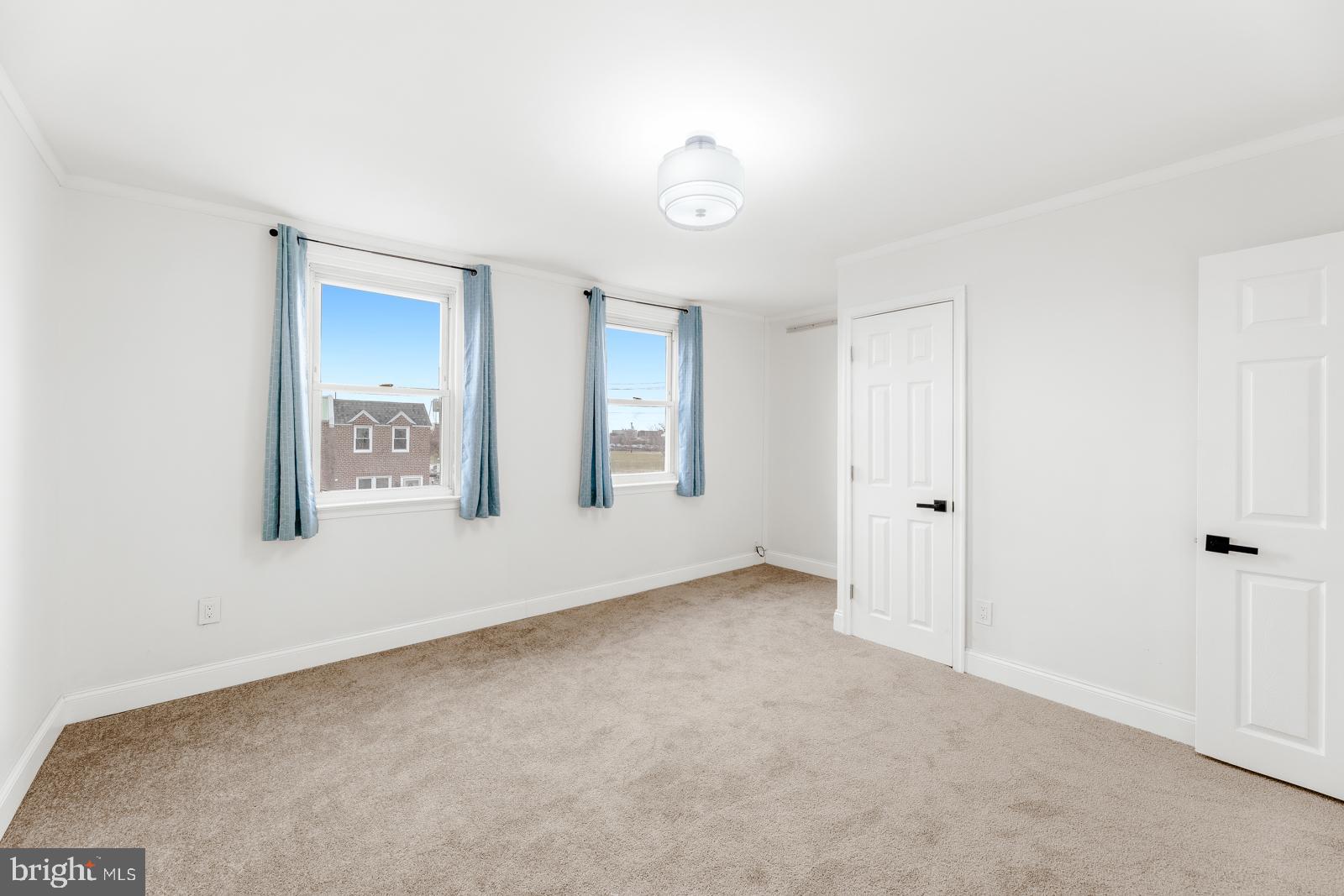 6302 Hegerman Street Philadelphia, PA 19135 - Photo 16 of 26 a view of an empty room with a window