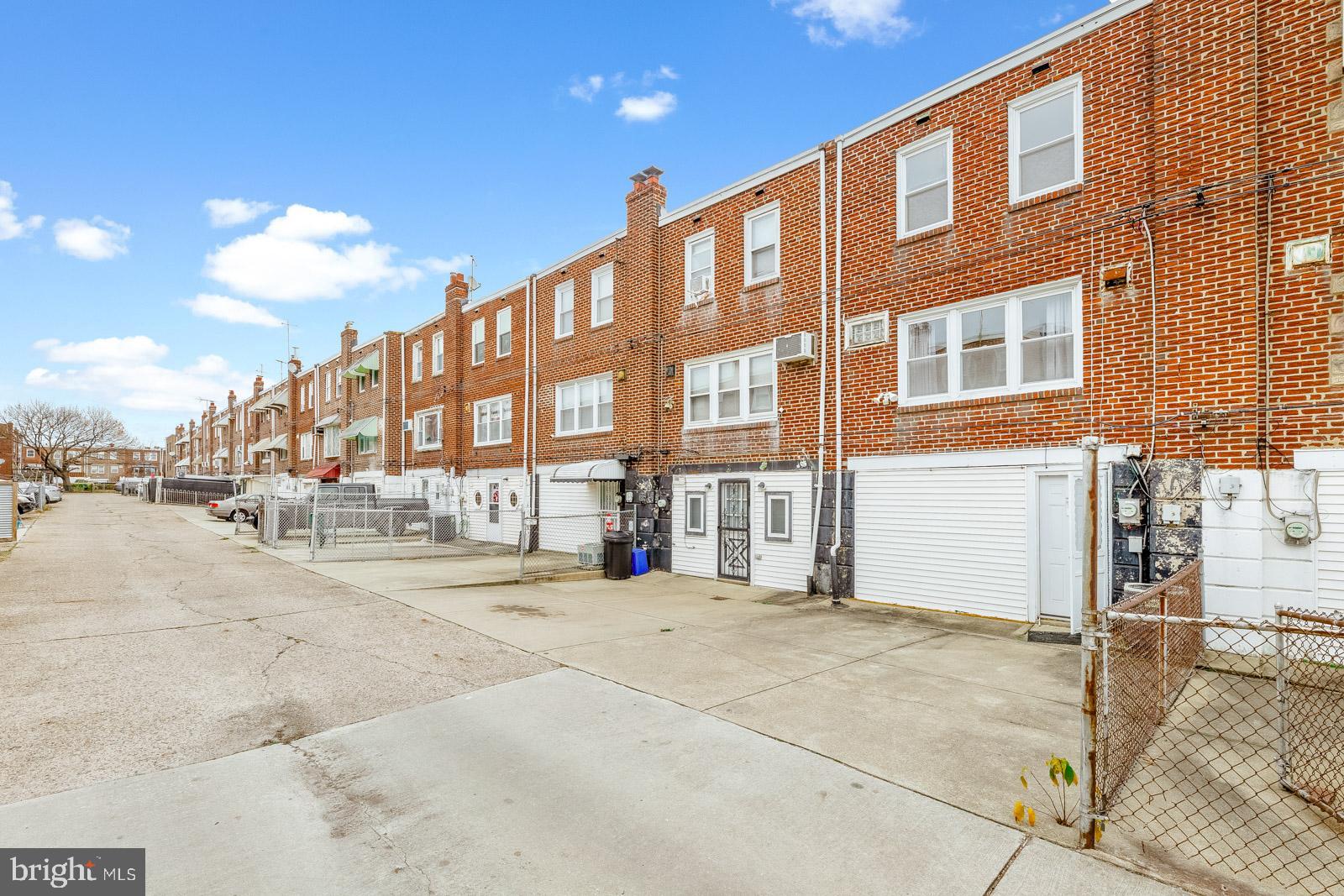 6302 Hegerman Street Philadelphia, PA 19135 - Photo 25 of 26 a view of a building with a street