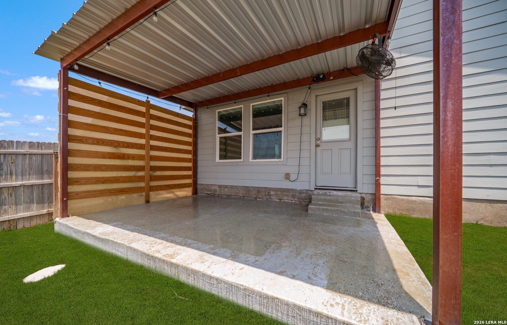 6566 Runaway Row Converse, TX 78109 - Photo 24 of 27 a view of house with backyard and a chair