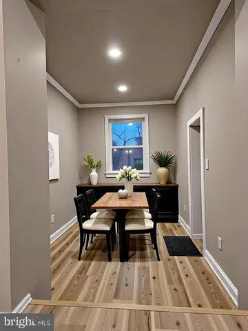 a view of a livingroom with furniture and a rug