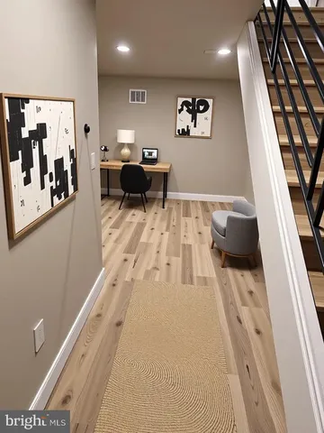 a view of a living room with a rug