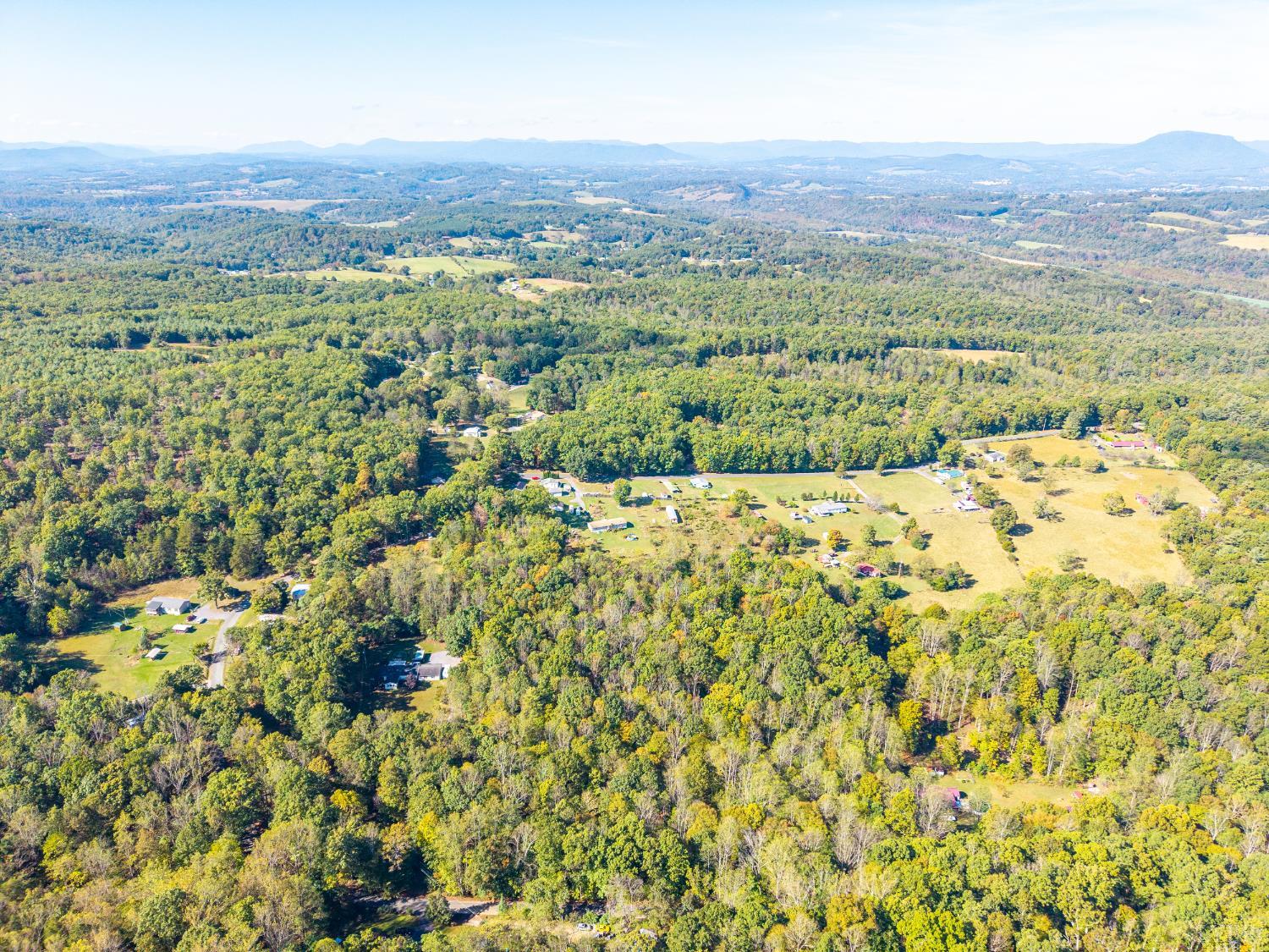 615 Stoney Run Road Buena Vista, VA 24416 - Photo 9 of 24 an aerial view of a houses with a yard and mountain