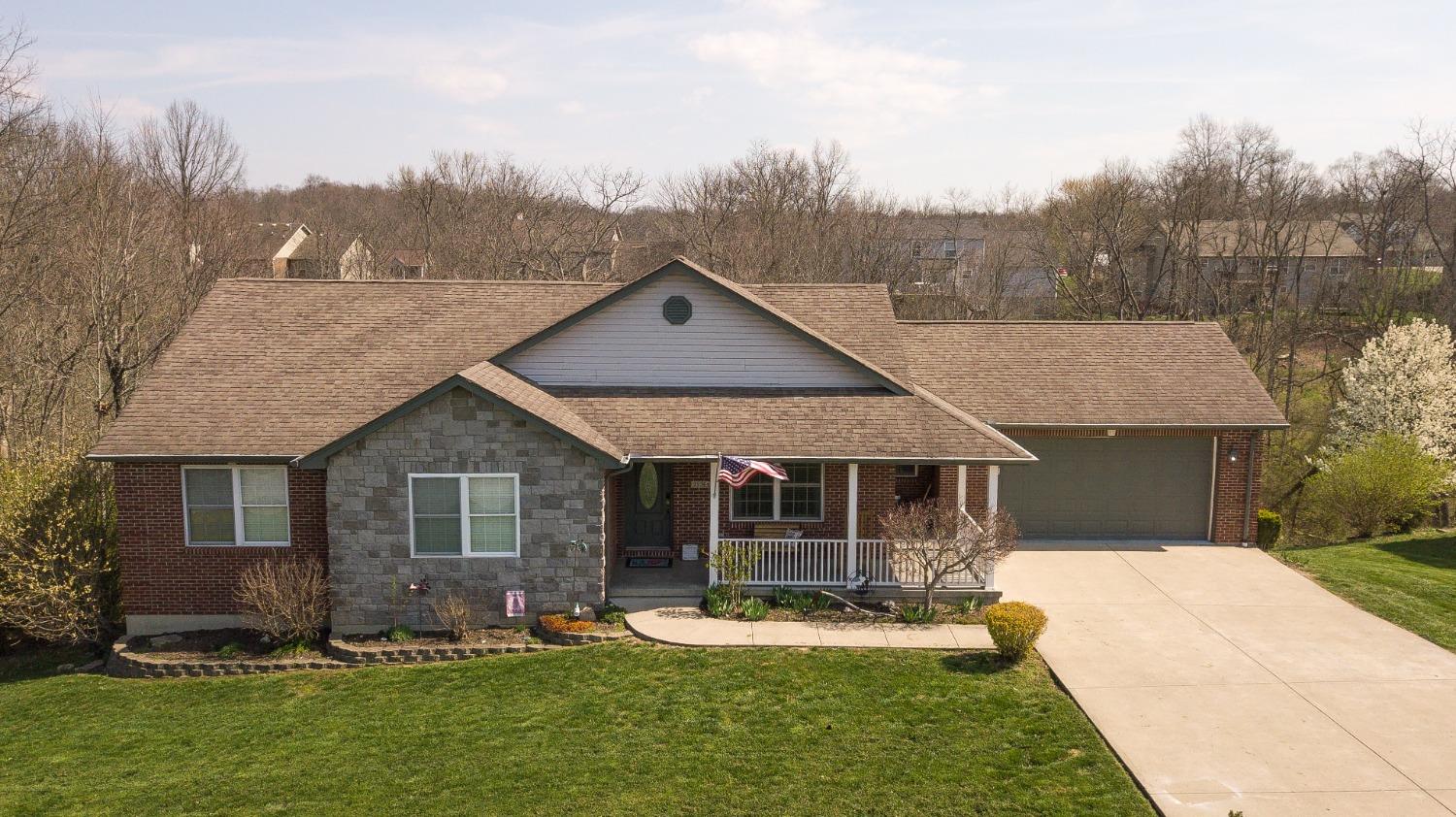 Attractive transitional ranch with flat driveway
