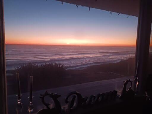 157 Brownell Road Eastham, MA 02642 - Photo 9 of 34 a view of an ocean from a balcony