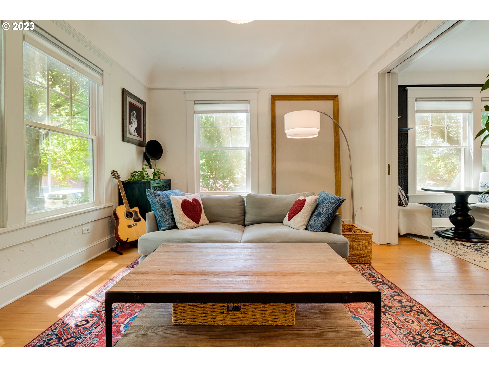 2129 Northwest Northrup Street, Unit 1 Portland, OR 97210 - Photo 13 of 37 a living room with furniture and a window