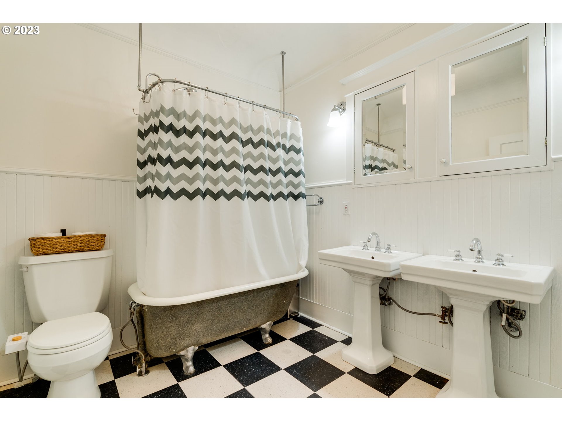 2129 Northwest Northrup Street, Unit 1 Portland, OR 97210 - Photo 28 of 37 a bathroom with a sink toilet and shower