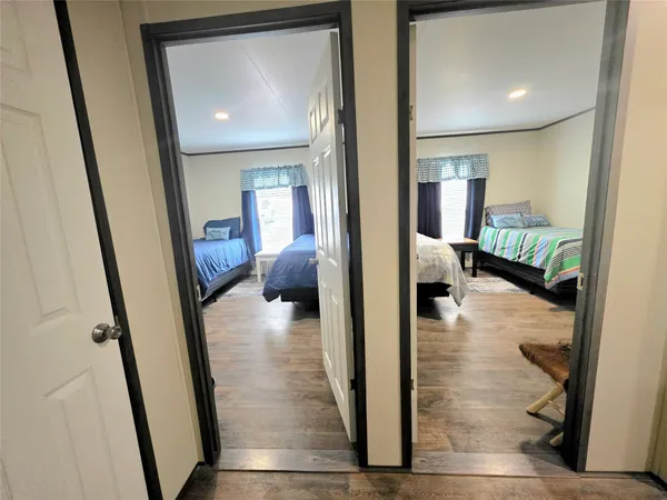 a view of a hallway view with living room and furniture