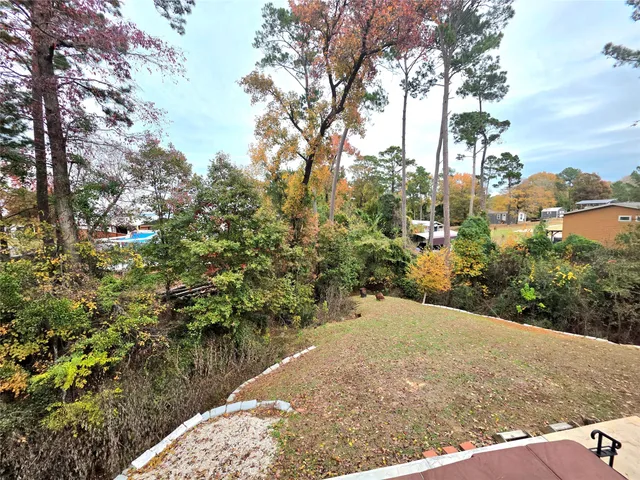 a view of a backyard of a house