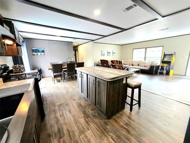 a room with lots of table and chairs