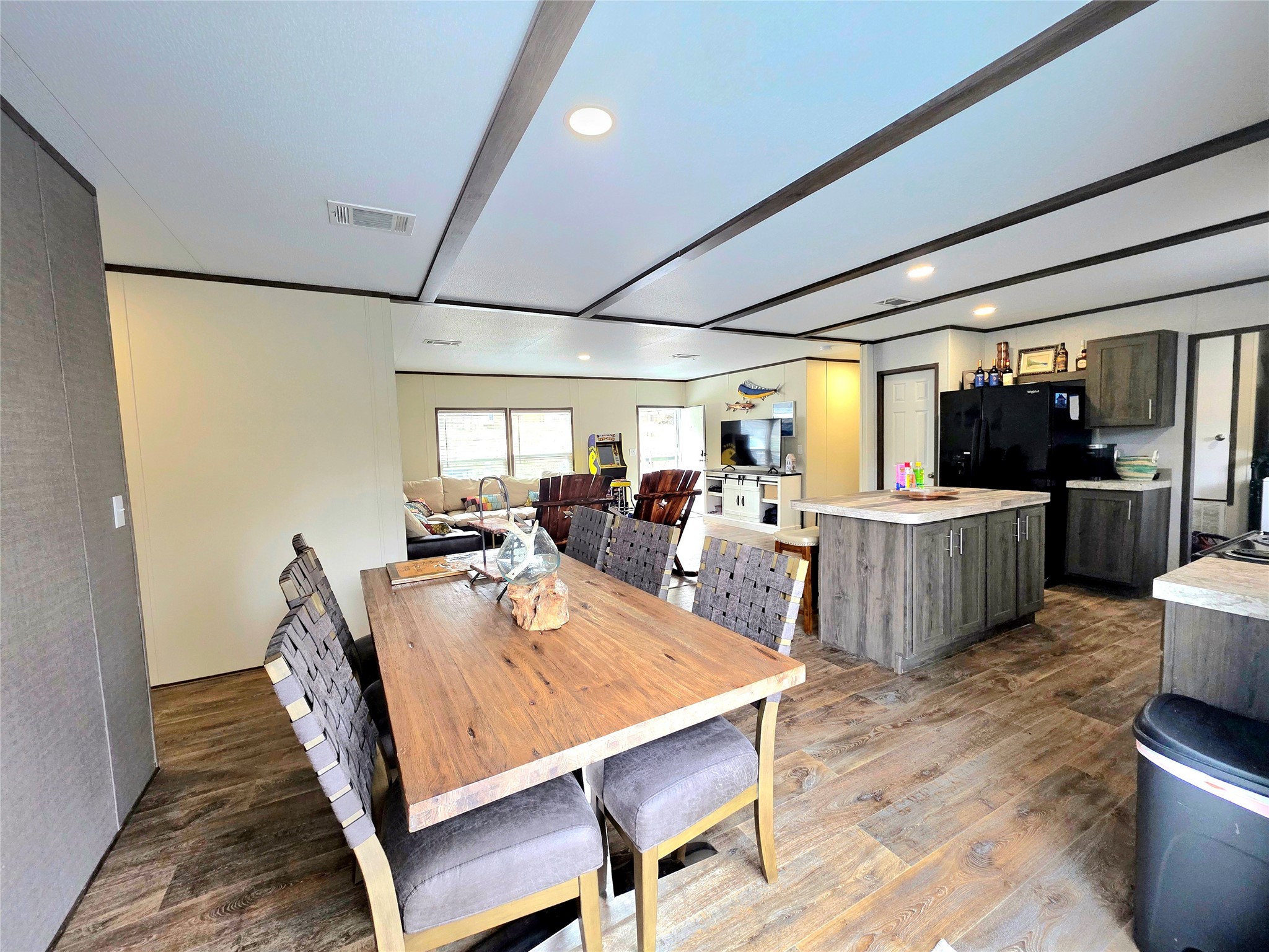 141 Canal Drive Point Blank, TX 77364 - Photo 7 of 28 a view of a dining room with furniture window and wooden floor