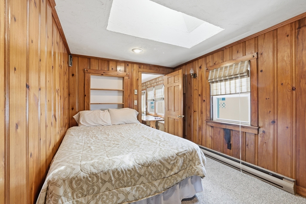 7 Swift Avenue Wareham, MA 02571 - Photo 18 of 42 a bedroom with a large bed and a large window