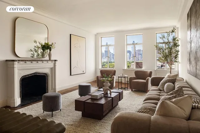 a living room with furniture or couch and a fireplace
