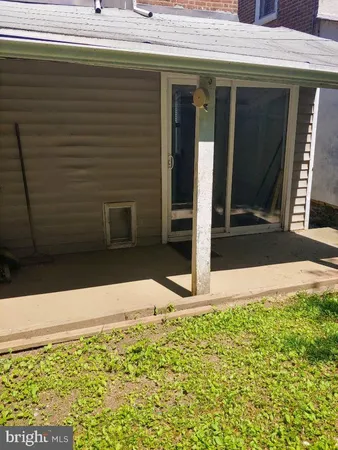a front view of a house with glass windows