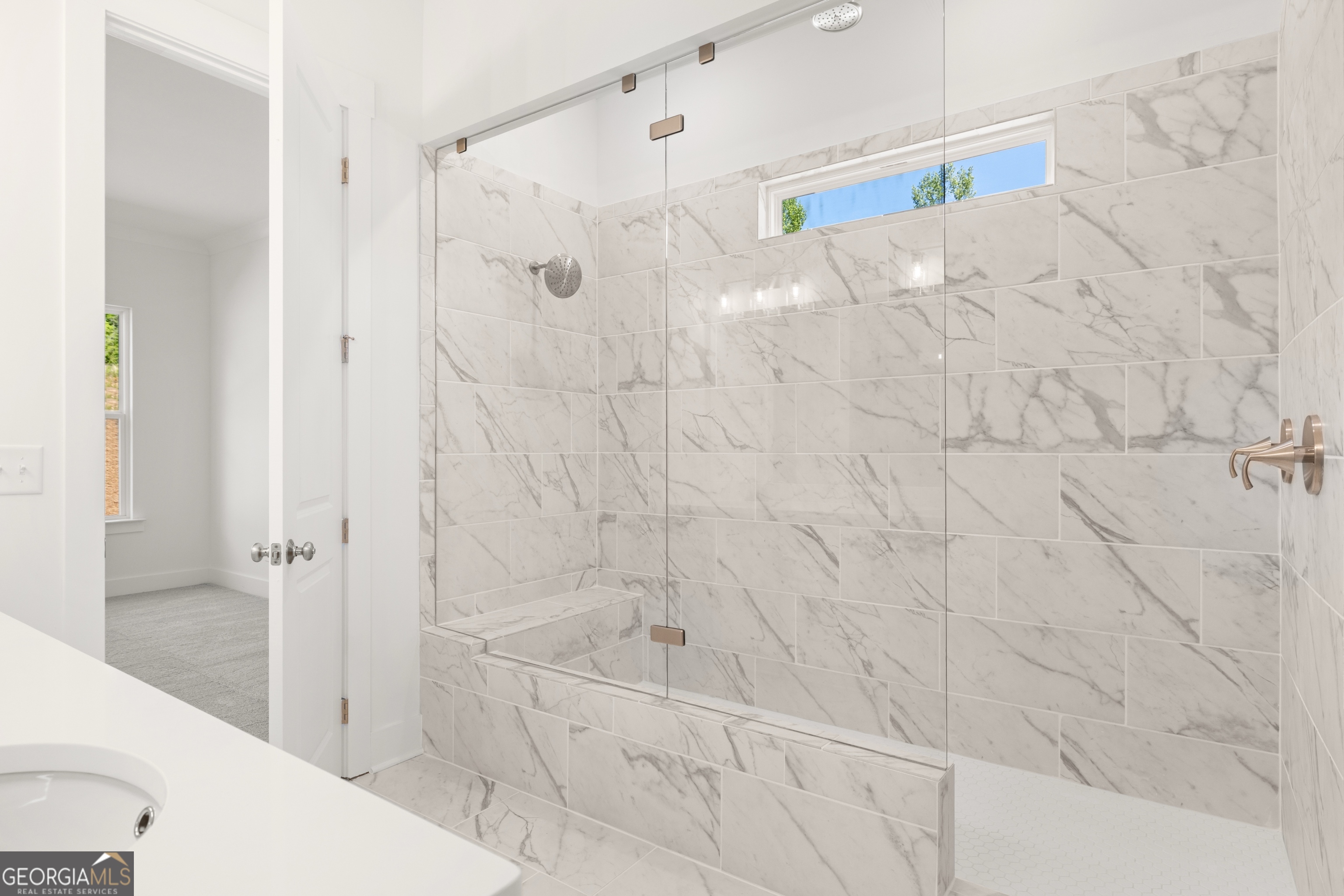 15 Overview Court Hoschton, GA 30548 - Photo 25 of 43 a bathroom with a shower