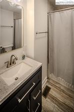 811 Pine Ridge Road Banner Elk, NC 28604 - Photo 20 of 35 a bathroom with a granite countertop sink and a mirror