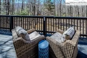 a balcony with wooden floor