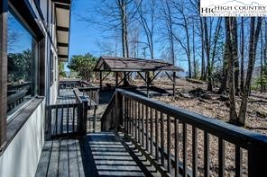 811 Pine Ridge Road Banner Elk, NC 28604 - Photo 29 of 35 a view of a balcony with wooden floor
