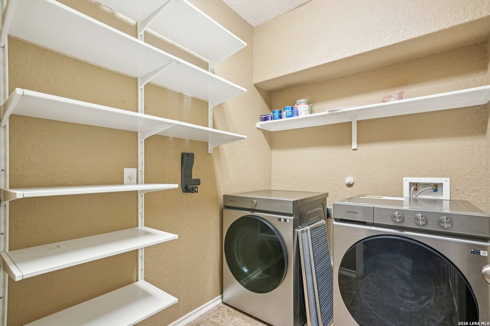 9536 Gold Stage Road San Antonio, TX 78254 - Photo 35 of 39 a utility room with dryer and washer