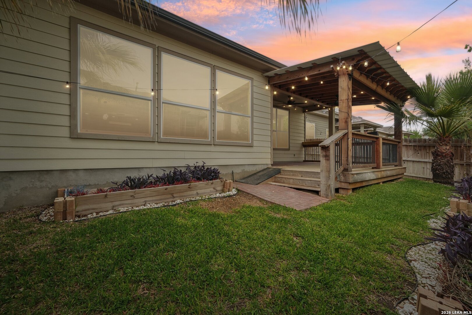 9536 Gold Stage Road San Antonio, TX 78254 - Photo 39 of 39 a view of a chair and table in backyard of the house