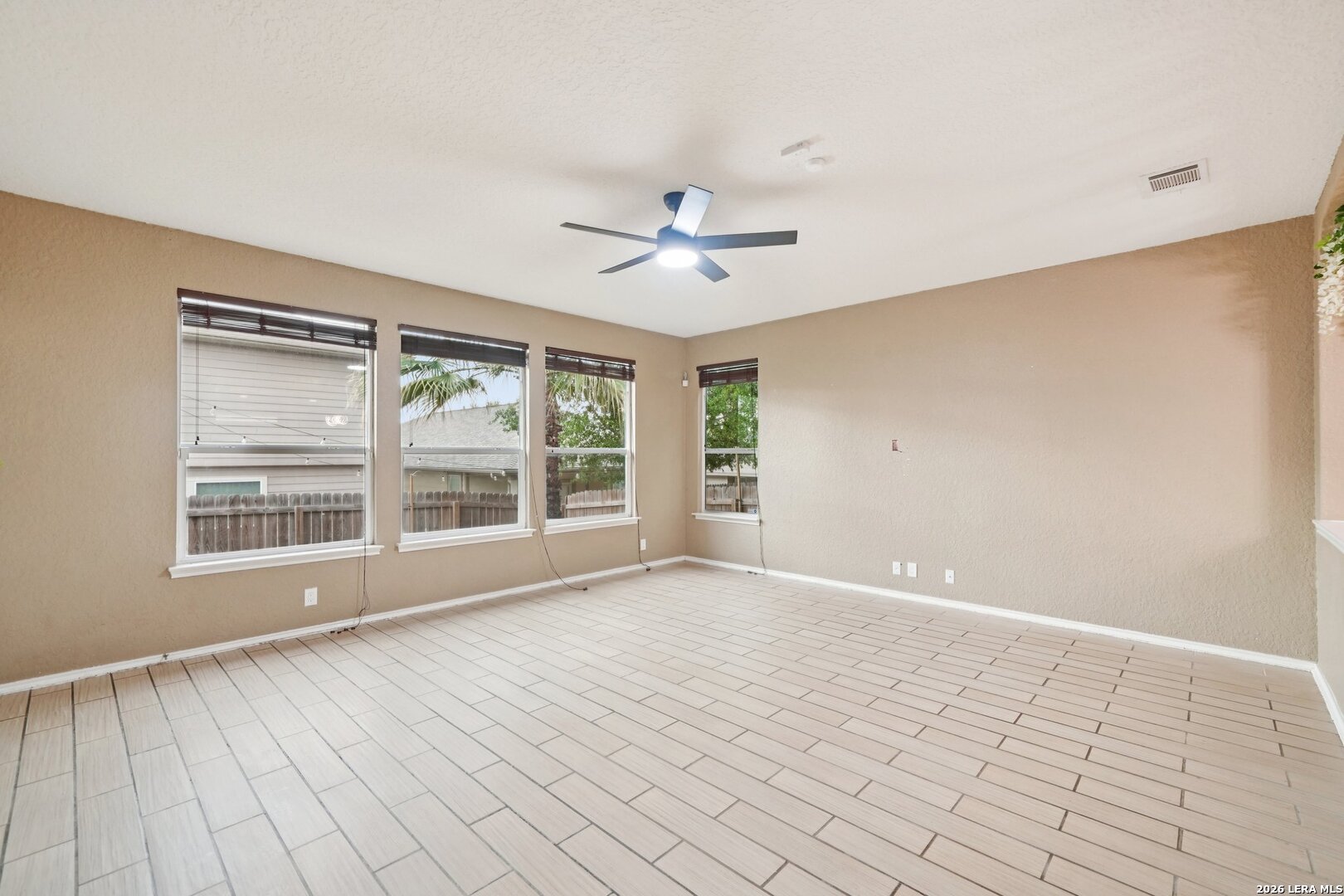 9536 Gold Stage Road San Antonio, TX 78254 - Photo 8 of 39 a view of an empty room with a window