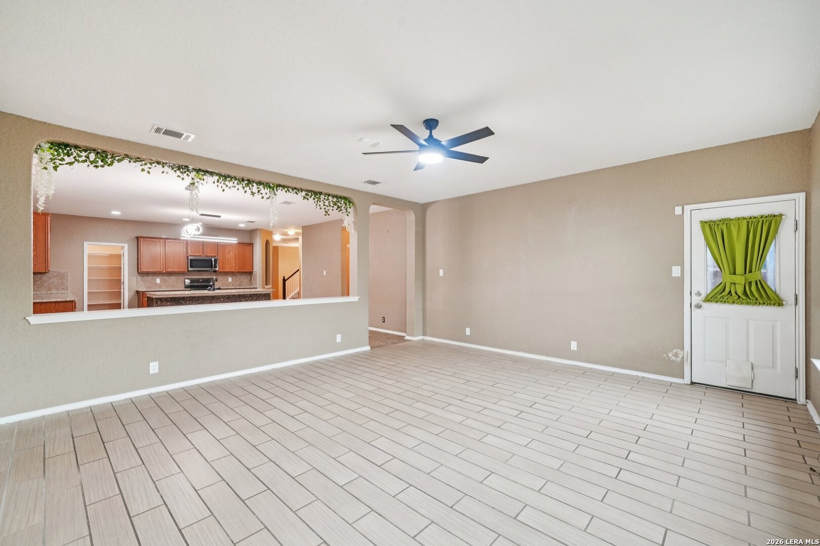 9536 Gold Stage Road San Antonio, TX 78254 - Photo 10 of 39 a view of an empty room with a window