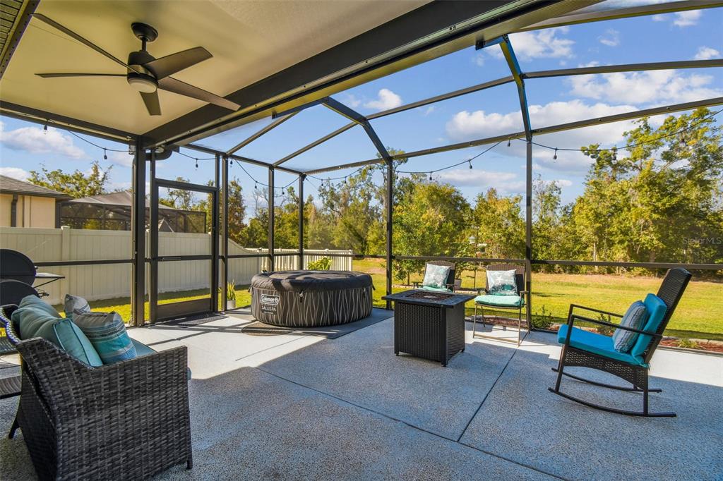 12907 Conquistador Loop Spring Hill, FL 34610 - Photo 50 of 74 a building outdoor space with seating