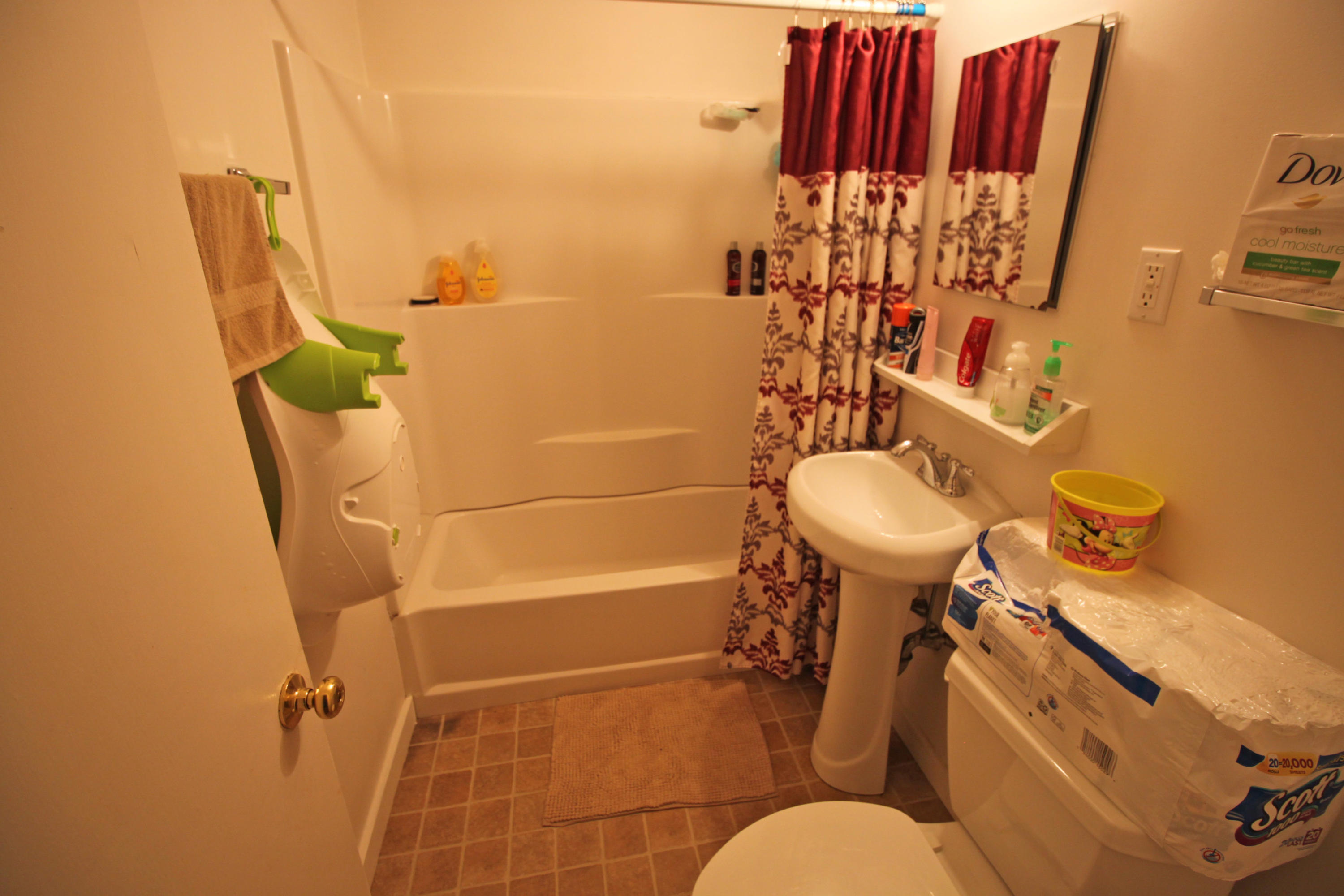 30 Fresh Holes Road, Unit 30 & 32 Hyannis, MA 02601 - Photo 11 of 27 a bathroom with a sink toilet and shower