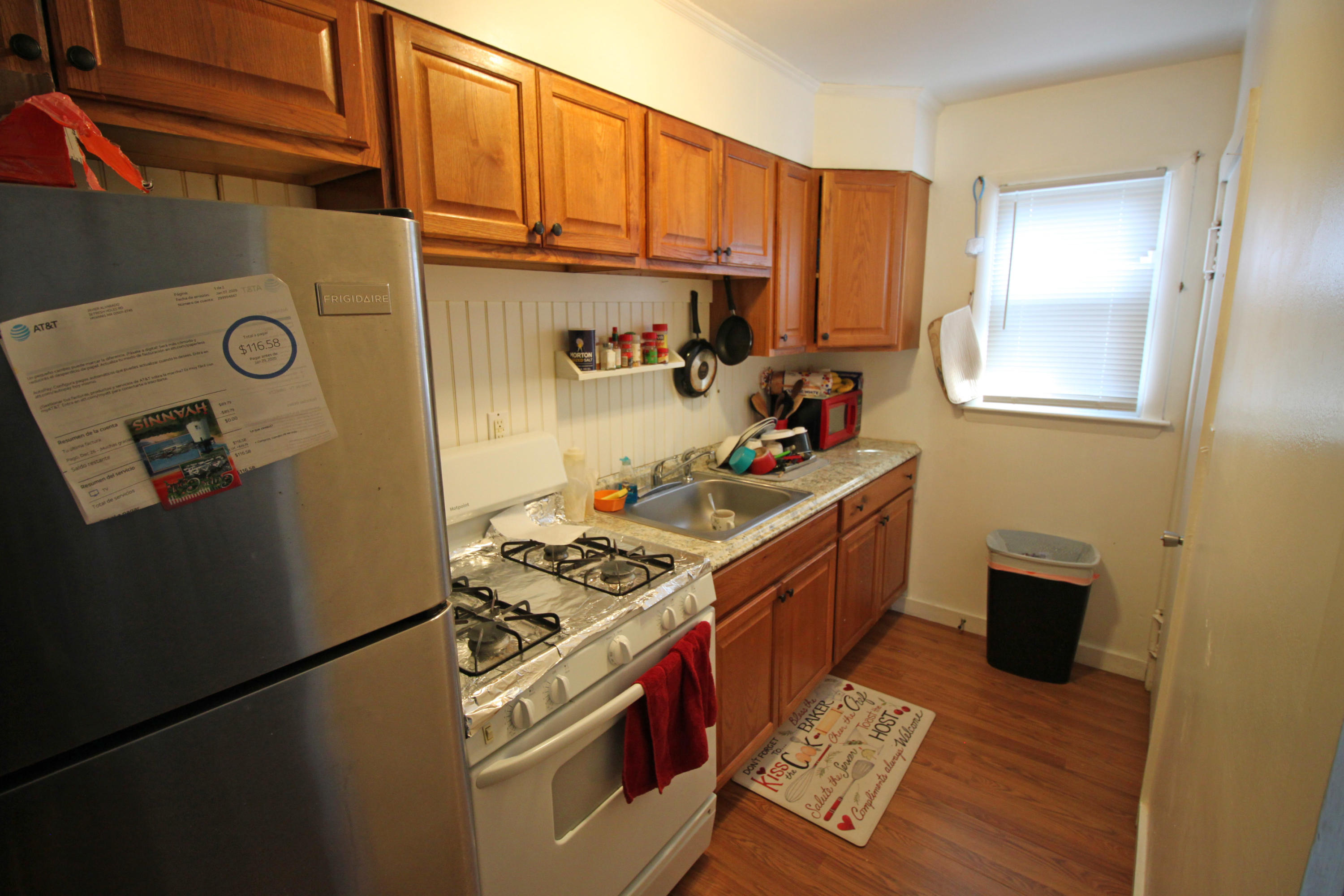 30 Fresh Holes Road, Unit 30 & 32 Hyannis, MA 02601 - Photo 5 of 27 a kitchen with stainless steel appliances a stove a refrigerator and cabinets