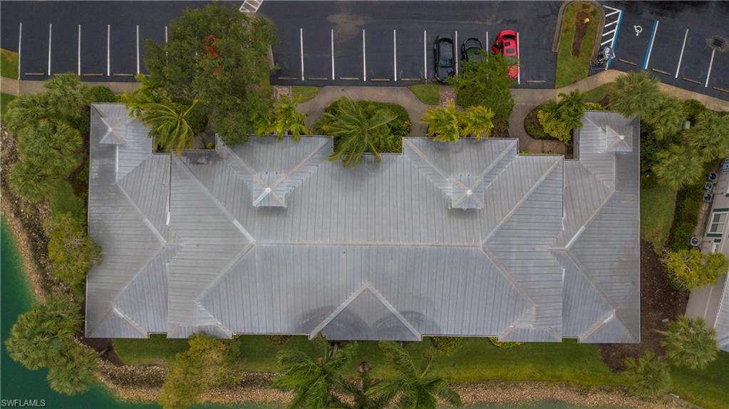 7870 Mahogany Run Lane, Unit 1713 Naples, FL 34113 - Photo 12 of 15 a aerial view of a house with garden